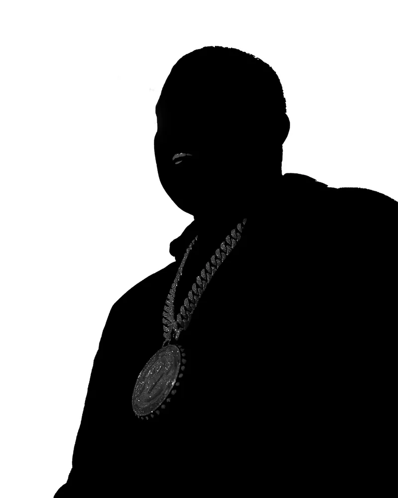 Silhouette portrait with a large pendant against a white background